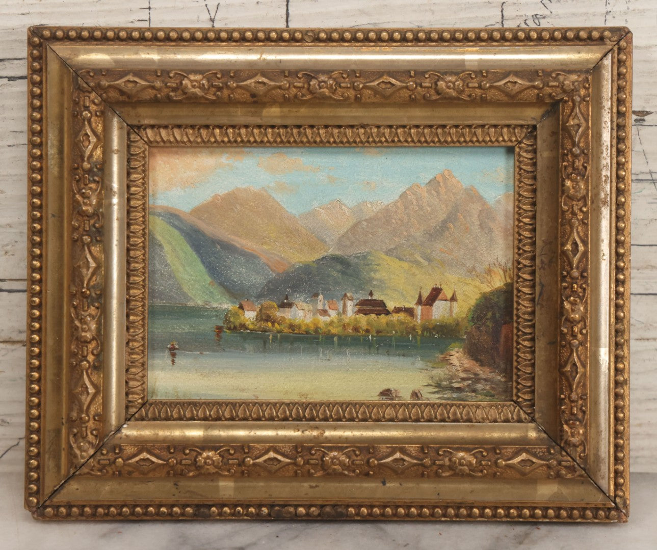 Lot 054 - Antique Miniature Painting On Board Of European Lakeside Mountain Town In Ornate Gilded Frame, 6-5/8" W x 5-1/2" H