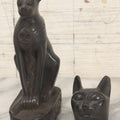 Lot 065 - Pair Of Vintage Egyptian Revival Bastet Cat Goddess Carved Composite Stone Figurine Statues, Including Full Body And Single Head