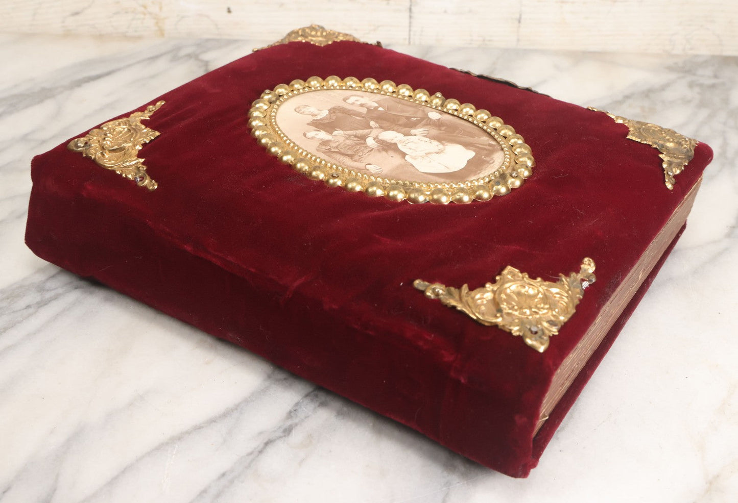 Lot 071 - Antique Victorian Family Photo Album With Replaced Red Velvet Cover With Family Portrait Cameo Containing 41 Cabinet Card Photographs Of Men Women And Children