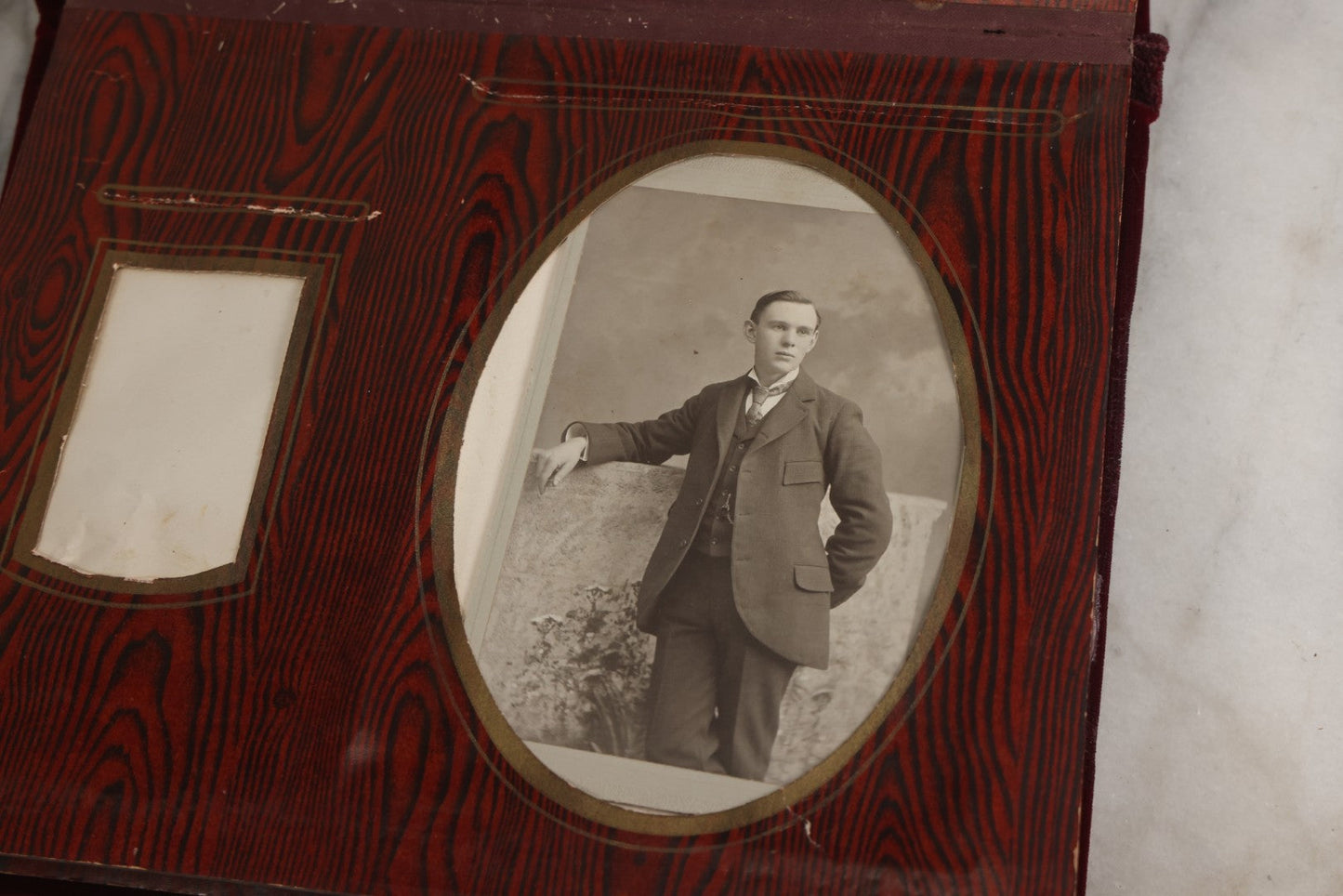 Lot 071 - Antique Victorian Family Photo Album With Replaced Red Velvet Cover With Family Portrait Cameo Containing 41 Cabinet Card Photographs Of Men Women And Children