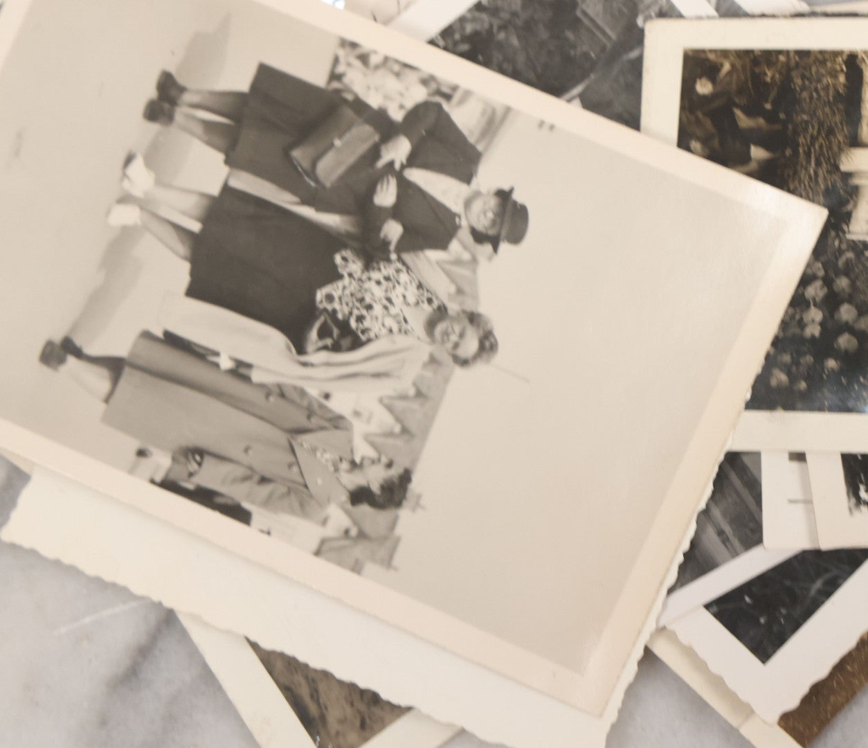 Lot 072 - Vintage Snapshot Photo Album With 80+ Photographs, Including Photos Of Europe, Naval Submarines And Battleships, Figural Topiary Sculpture Shrub Garden, Old Stone Houses, Pets And More, Many Loose Photos