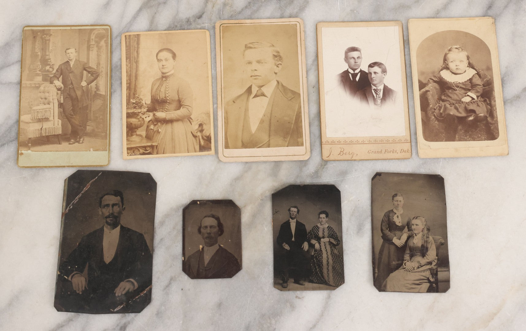 Lot 076 - Mixed Antique Portrait Photography Grouping With Four Tintype And Five Carte De Visite C.D.V. Photographs Including Tintype Of Two Young Women, Man With Goatee, C.D.V. Of Woman With Plant, And More