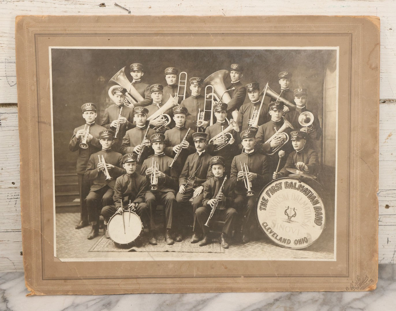 Lot 077 - Antique Boarded Photograph Of The First Dalmation Band, Hrvatski Dalmatianski Sinovi (Croatian Dalmatian Sons), Twenty-One Piece Horn And Drum Band