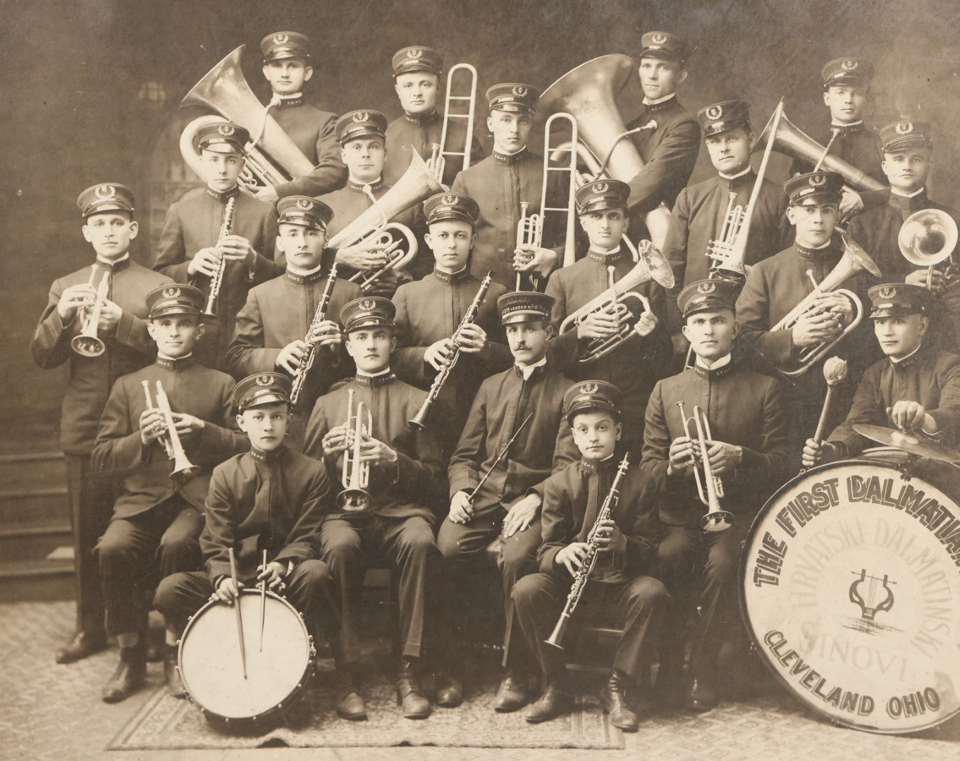 Lot 077 - Antique Boarded Photograph Of The First Dalmation Band, Hrvatski Dalmatianski Sinovi (Croatian Dalmatian Sons), Twenty-One Piece Horn And Drum Band