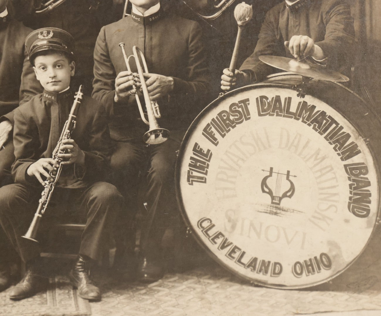 Lot 077 - Antique Boarded Photograph Of The First Dalmation Band, Hrvatski Dalmatianski Sinovi (Croatian Dalmatian Sons), Twenty-One Piece Horn And Drum Band