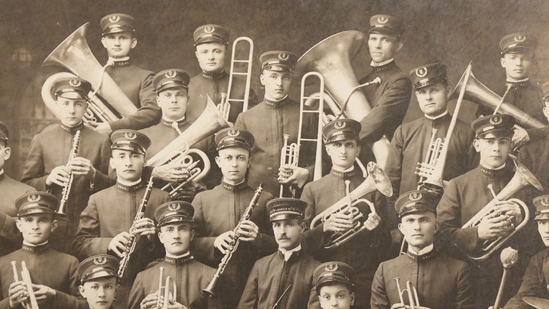 Lot 077 - Antique Boarded Photograph Of The First Dalmation Band, Hrvatski Dalmatianski Sinovi (Croatian Dalmatian Sons), Twenty-One Piece Horn And Drum Band