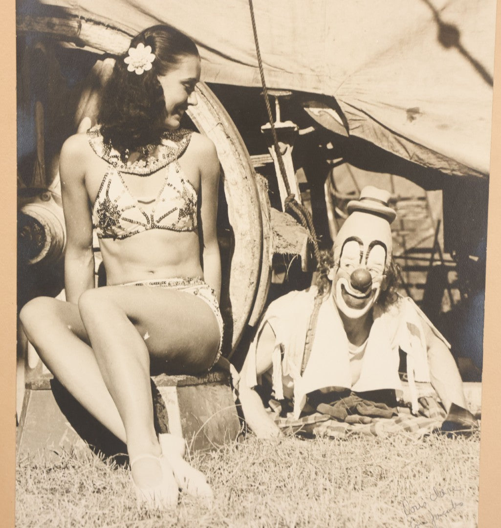 Lot 079 - Vintage Boarded Photograph Of Costume Designer Doris Clare Posing With Circus Clown Lou Jacobs, Both In Costume, In Front Of Circus Wagon