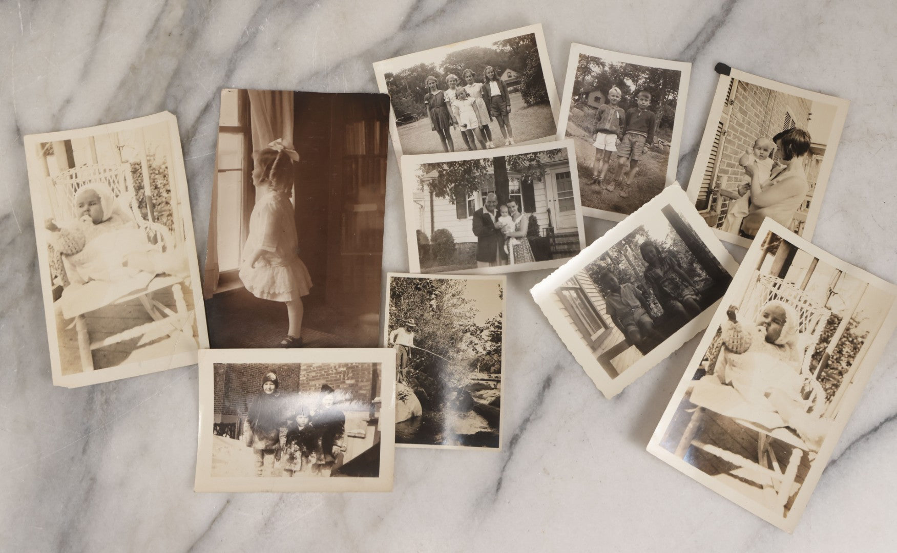 Lot 085 - Grouping Of 50+ Vintage Snapshot Photographs, Mostly Of Children At Play, Including Boy Dressed As Cowboy, Boy Dressed As Canadian Mountie Police Officer With Pistol, Children Skiing, Sledding, And More, Circa 1920s To 1960s