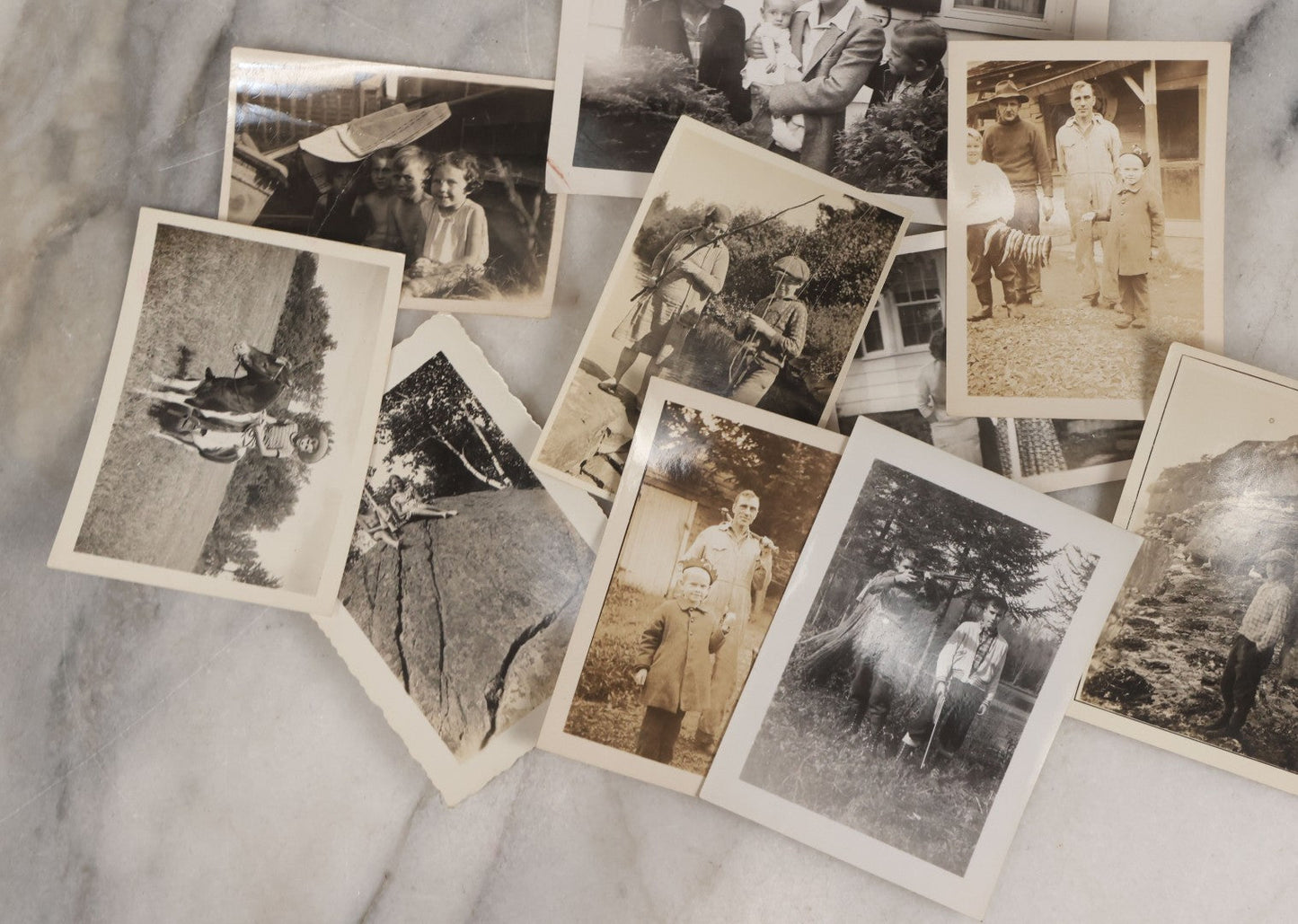 Lot 085 - Grouping Of 50+ Vintage Snapshot Photographs, Mostly Of Children At Play, Including Boy Dressed As Cowboy, Boy Dressed As Canadian Mountie Police Officer With Pistol, Children Skiing, Sledding, And More, Circa 1920s To 1960s