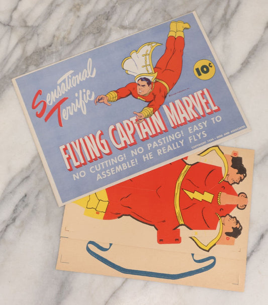Lot 091 - Vintage Flying Captain Marvel "Sensational Terrific" Paper Craft Toy In Original Folder, Appears To Be Complete, Copyright 1944, Reed And Associates, Fawcett Publications Inc.
