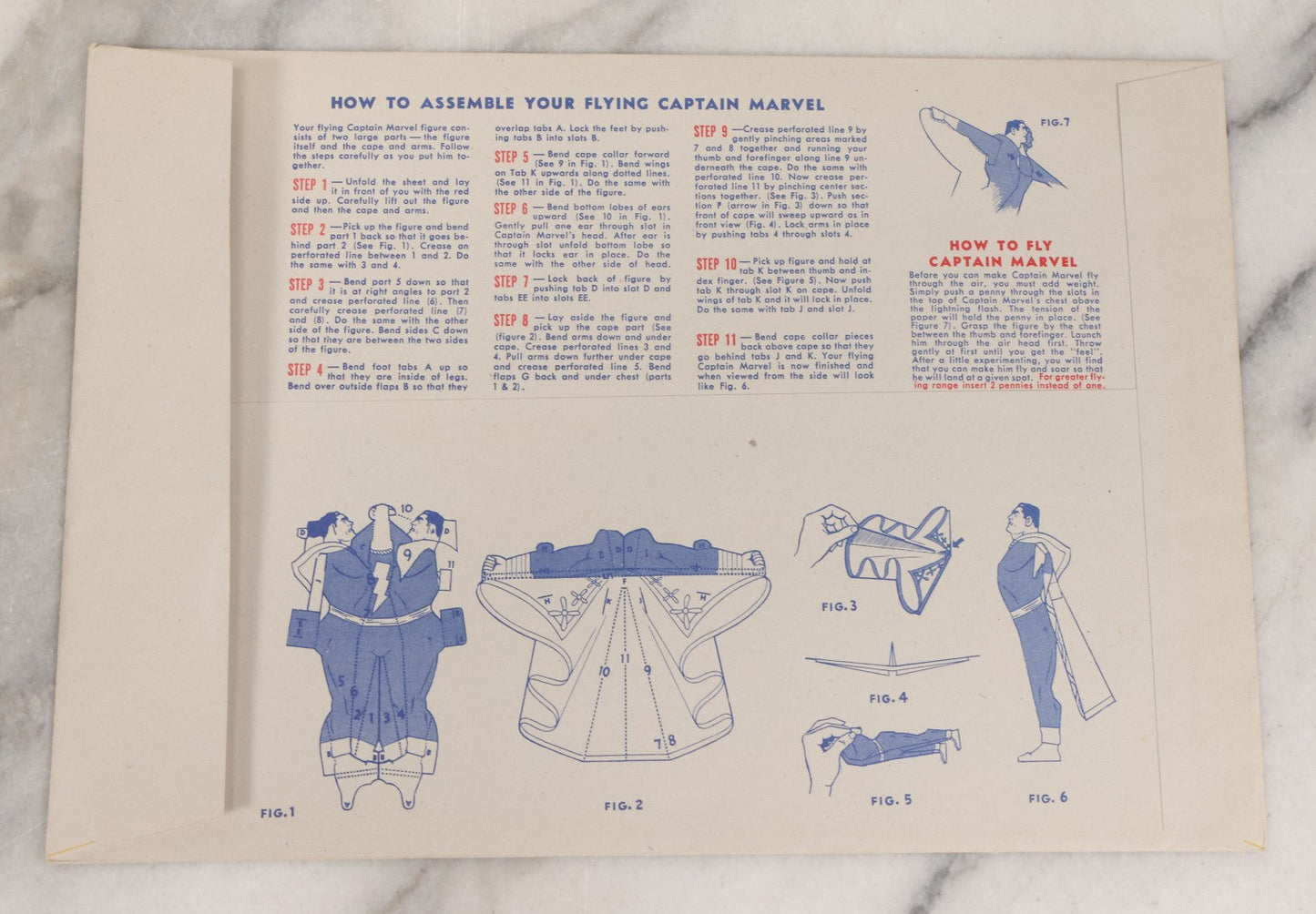 Lot 091 - Vintage Flying Captain Marvel "Sensational Terrific" Paper Craft Toy In Original Folder, Appears To Be Complete, Copyright 1944, Reed And Associates, Fawcett Publications Inc.
