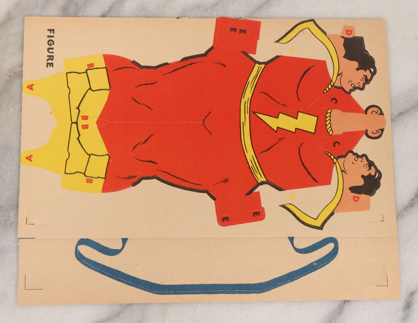 Lot 091 - Vintage Flying Captain Marvel "Sensational Terrific" Paper Craft Toy In Original Folder, Appears To Be Complete, Copyright 1944, Reed And Associates, Fawcett Publications Inc.