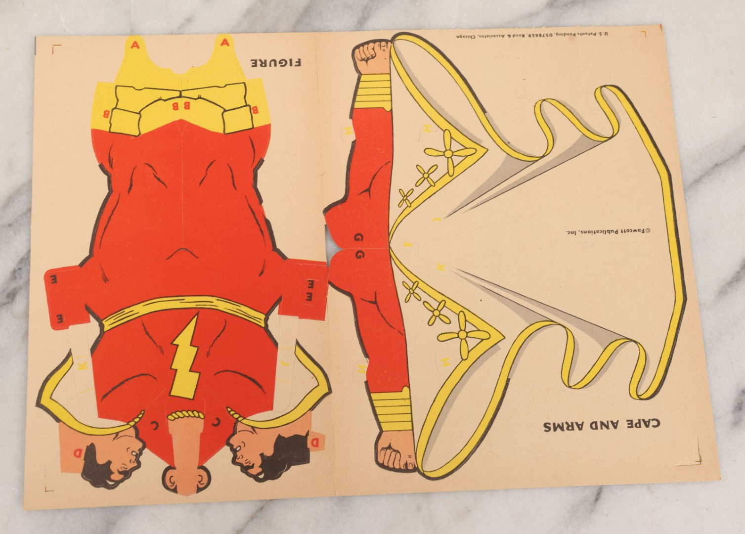 Lot 091 - Vintage Flying Captain Marvel "Sensational Terrific" Paper Craft Toy In Original Folder, Appears To Be Complete, Copyright 1944, Reed And Associates, Fawcett Publications Inc.