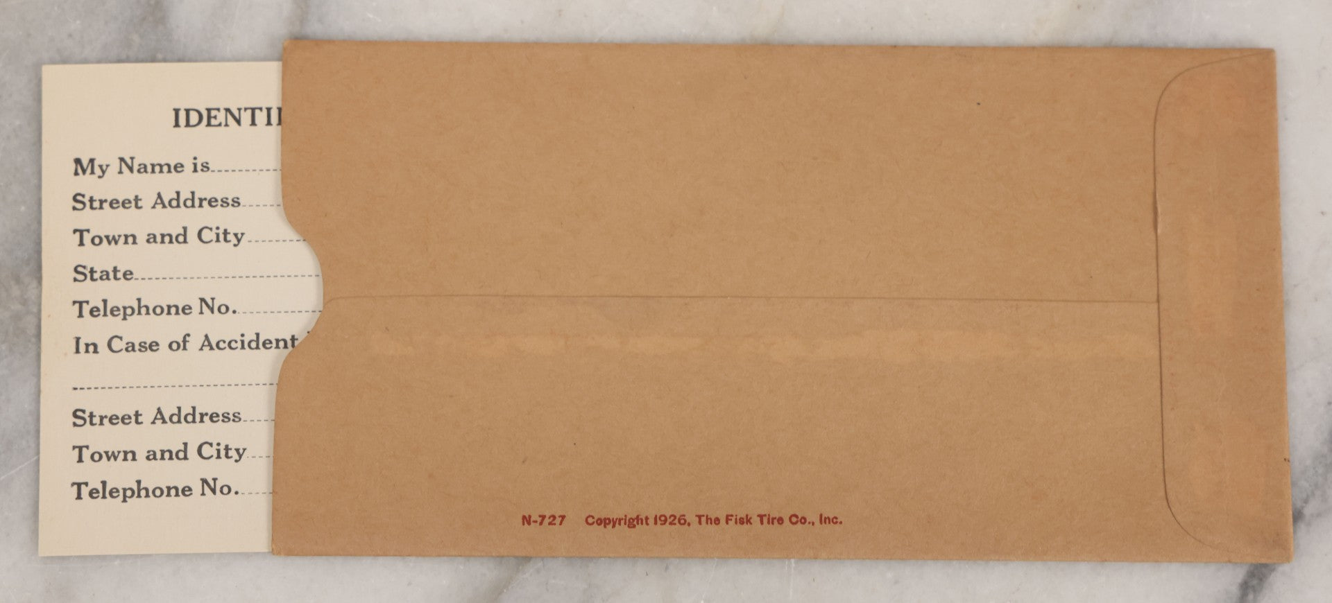 Lot 098 - Two Piece Vintage Ephemera Grouping Advertising The Fisk Tire Co., Inc., Including "The Fisk Winners" Blotter, Copyright 1928, And Foldered Gasoline Price Calculator, Copyright 1926