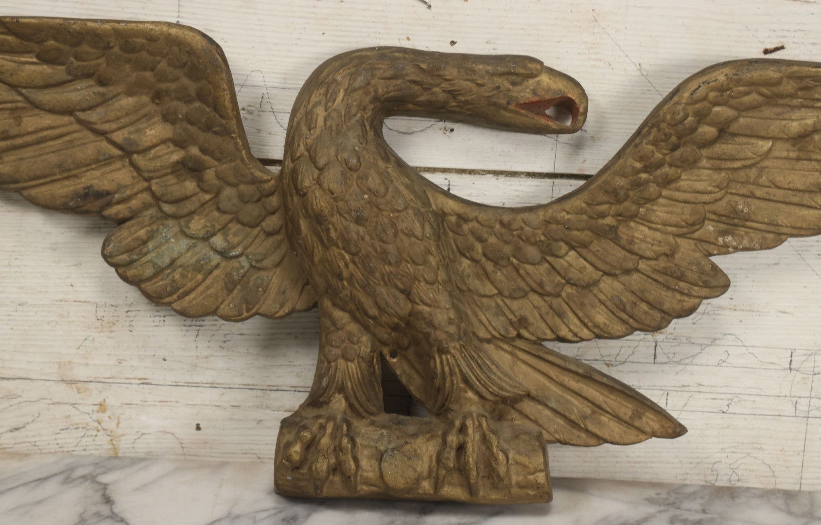 Lot 002 - Antique Painted Cast Iron Patriotic Americana Eagle With Gold And Red Paint, Eagle Perched On Branch, Three Mounting Holes, Wingspan 30-1/2"