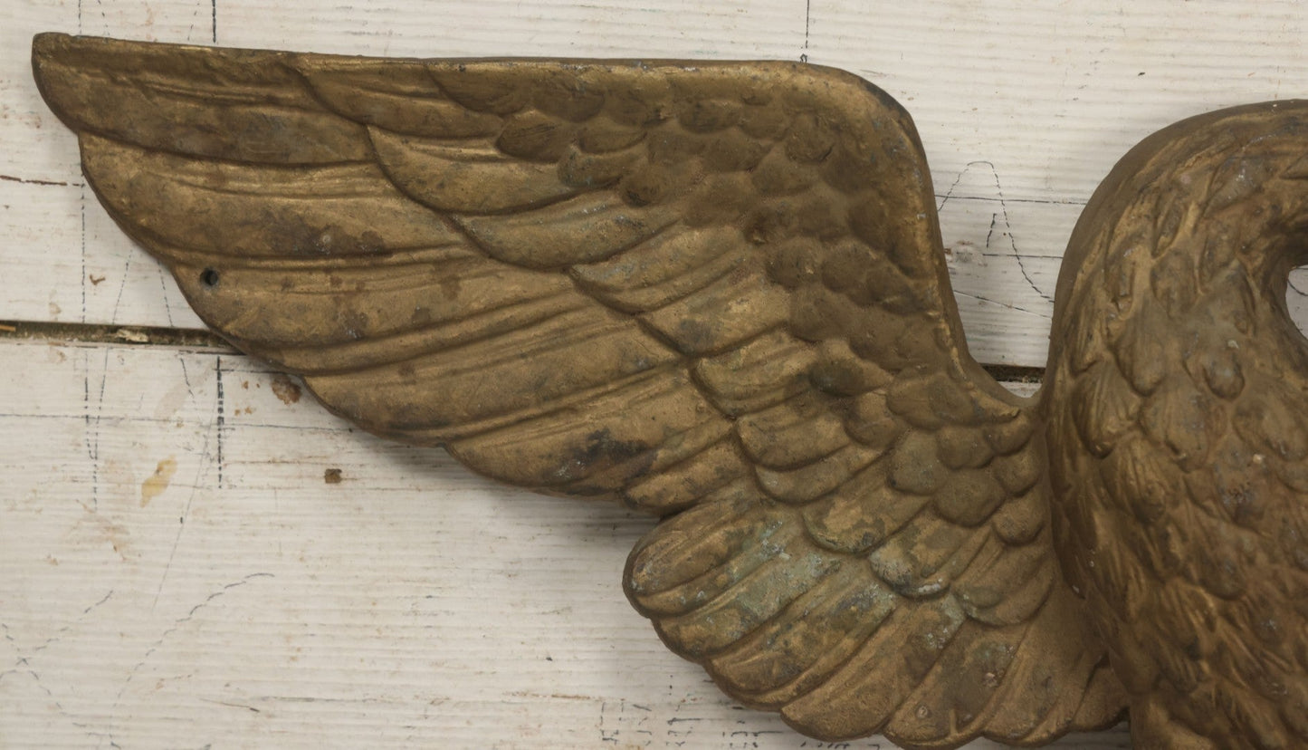 Lot 002 - Antique Painted Cast Iron Patriotic Americana Eagle With Gold And Red Paint, Eagle Perched On Branch, Three Mounting Holes, Wingspan 30-1/2"