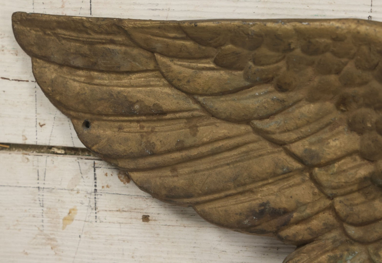 Lot 002 - Antique Painted Cast Iron Patriotic Americana Eagle With Gold And Red Paint, Eagle Perched On Branch, Three Mounting Holes, Wingspan 30-1/2"
