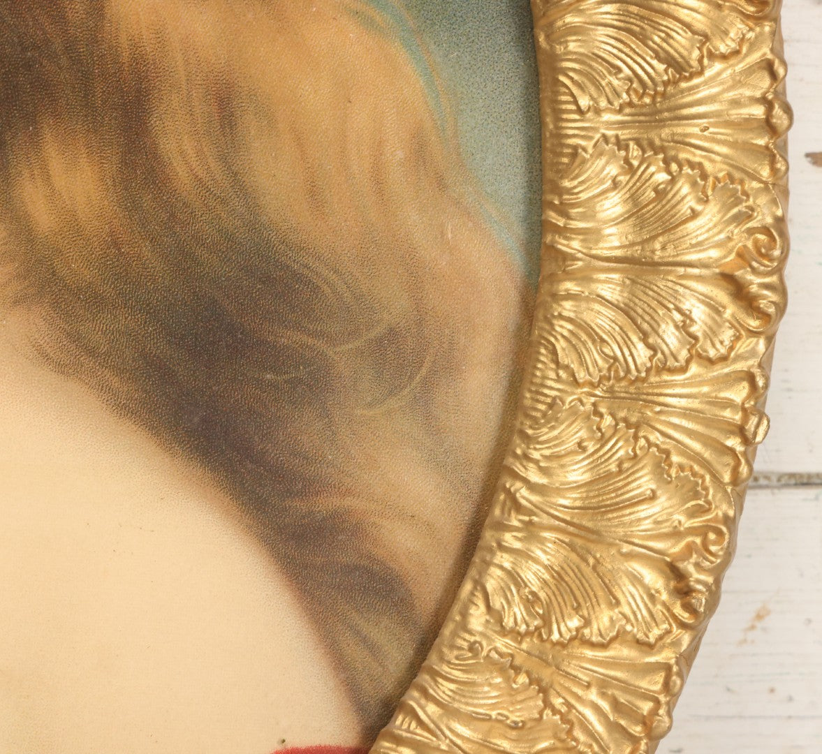 Lot 006 - Antique Chromolithograph Portrait Print Of Blue-Eyed Brunette Beauty With Red Velvet Cap And Loose Fitting Red Gown In Ornate Gilded Molded Gesso Oval Frame, 21" x 25"