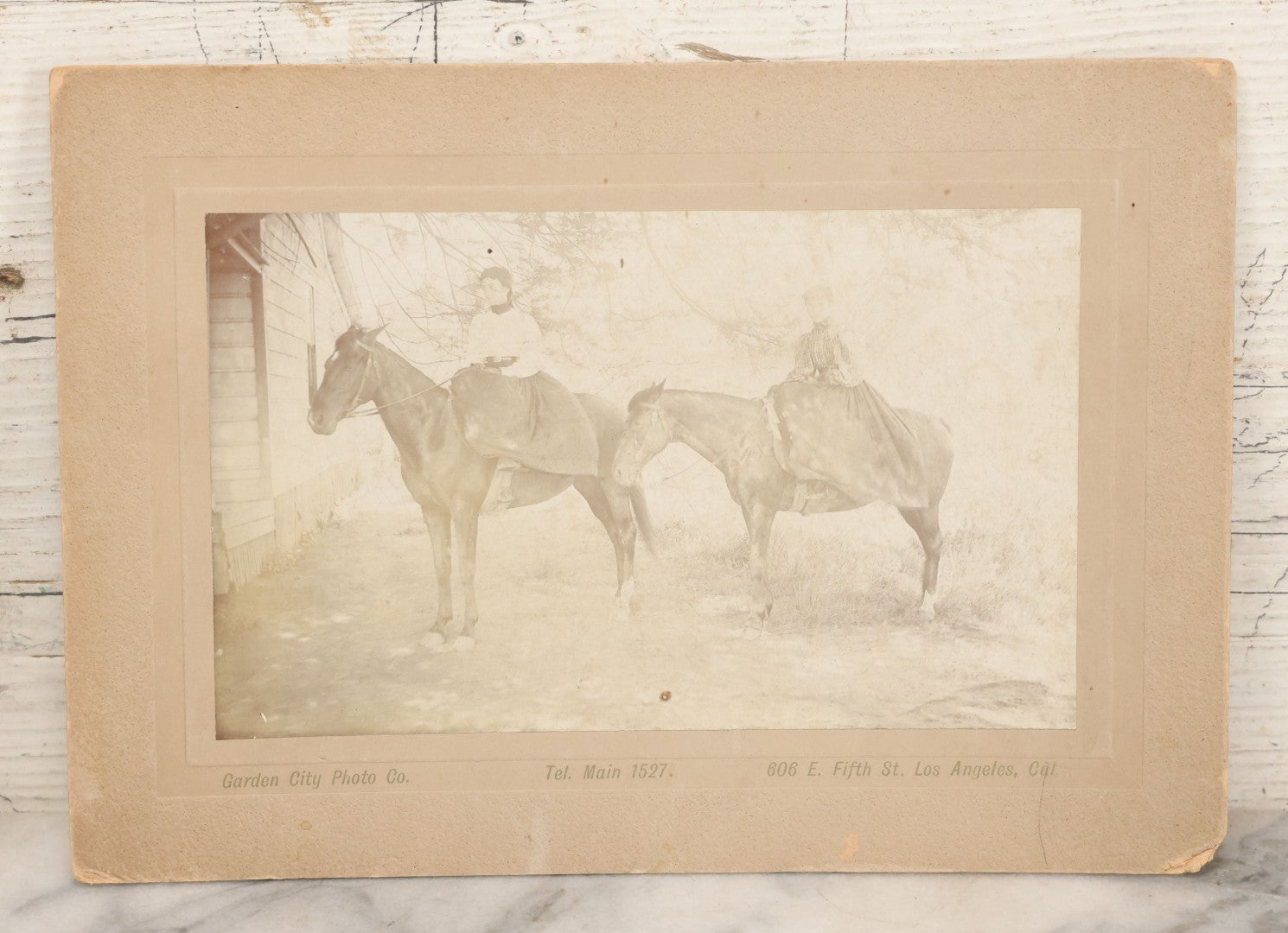 Lot 144 - Antique Boarded Photograph Of Two L.A. Cowgirls, Women Riding Horseback, Photographed By The Garden City Photo Co., Los Angeles, California, Photo No. 16504