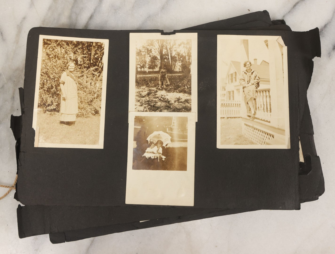 Lot 010 - Antique Vernacular Snapshot Photo Album With 90+ Photographs Circa 1910-1920, Including Baseball Player, Woman Posing With Flag, Bartenders, Many Dogs And Pets, And More