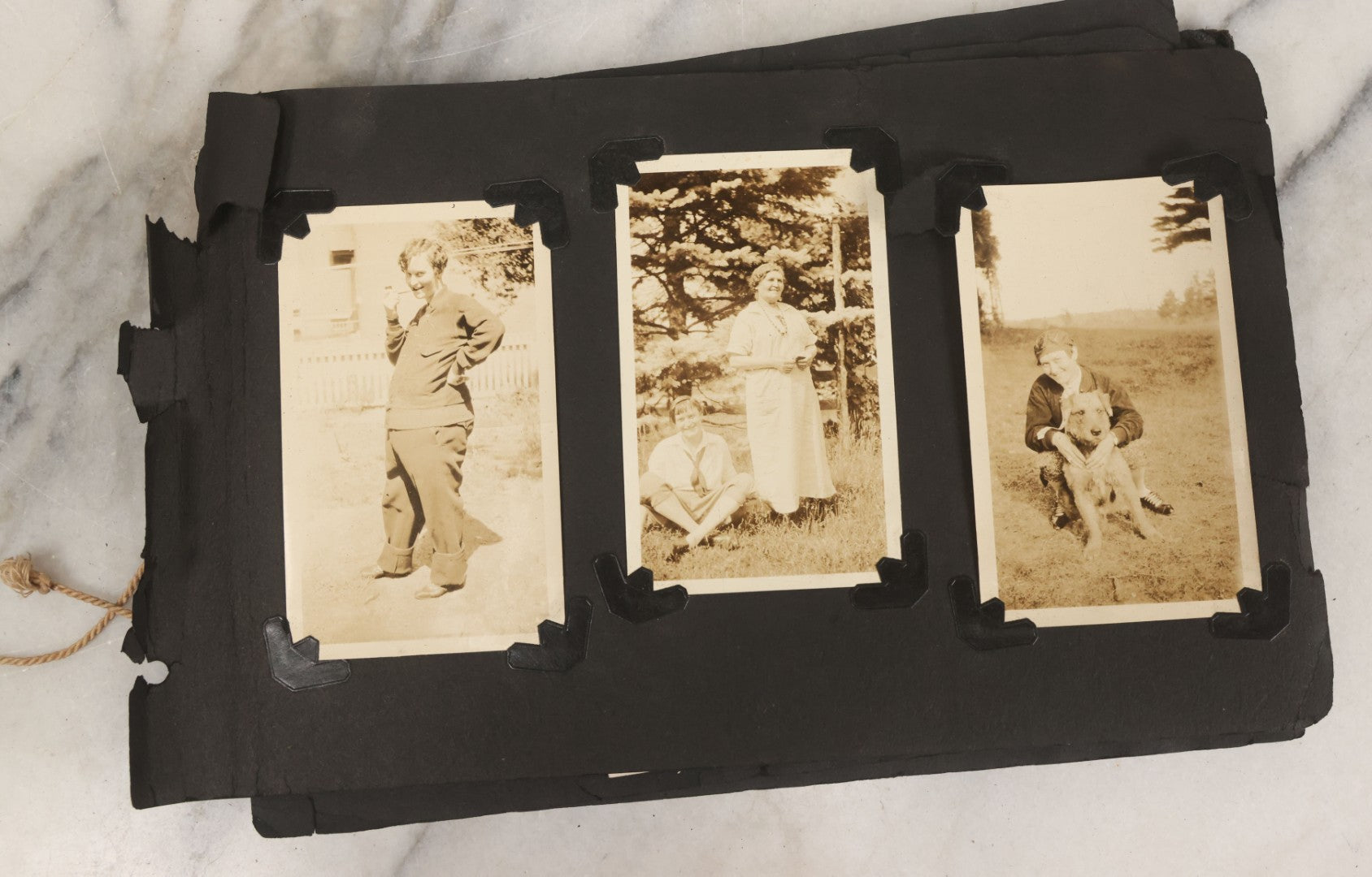 Lot 010 - Antique Vernacular Snapshot Photo Album With 90+ Photographs Circa 1910-1920, Including Baseball Player, Woman Posing With Flag, Bartenders, Many Dogs And Pets, And More
