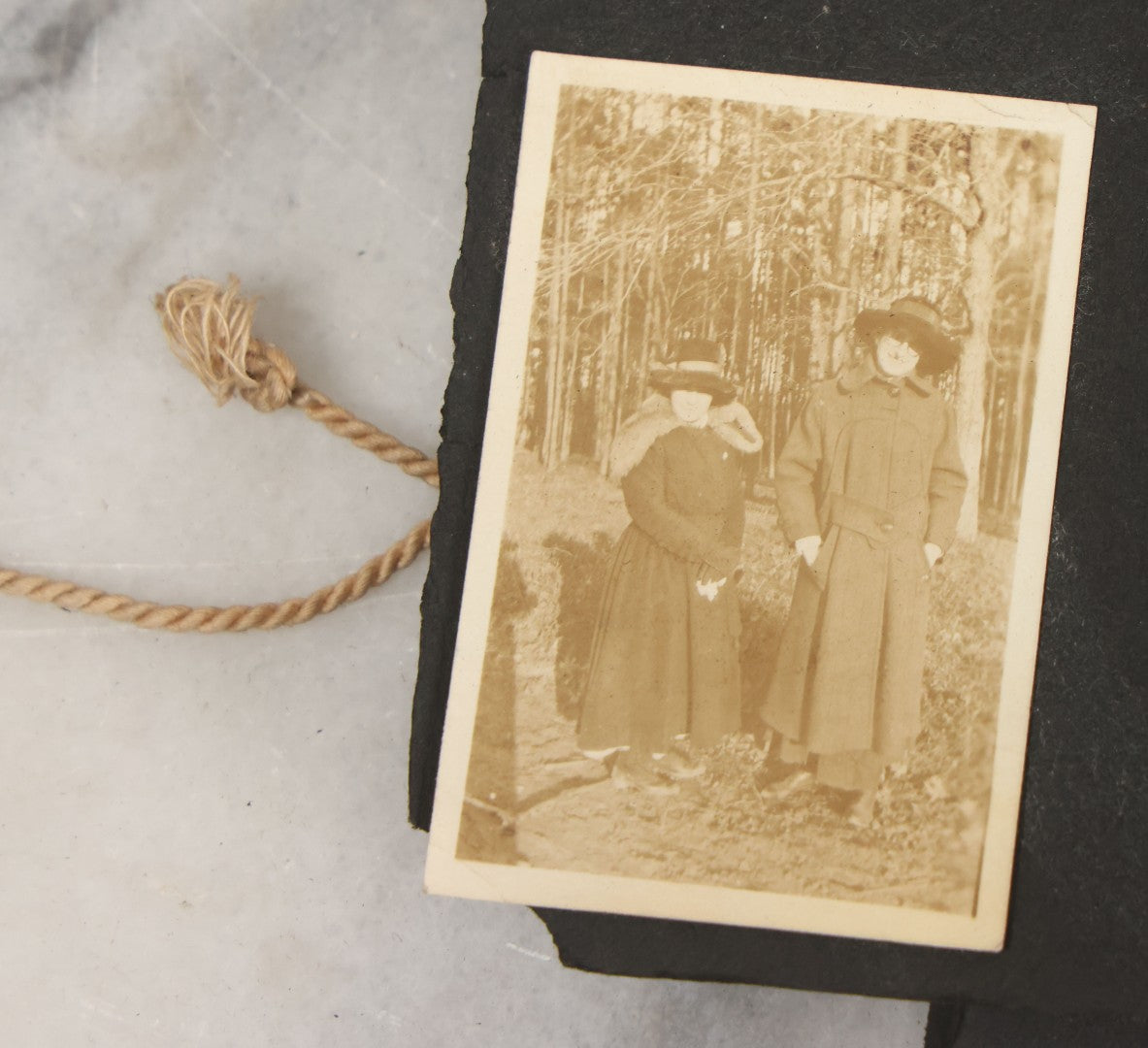 Lot 010 - Antique Vernacular Snapshot Photo Album With 90+ Photographs Circa 1910-1920, Including Baseball Player, Woman Posing With Flag, Bartenders, Many Dogs And Pets, And More