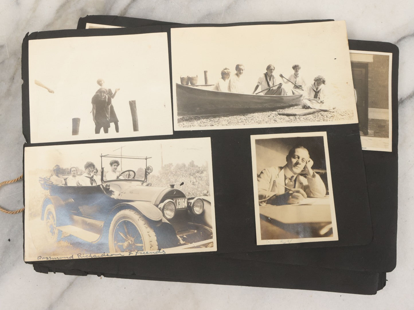 Lot 010 - Antique Vernacular Snapshot Photo Album With 90+ Photographs Circa 1910-1920, Including Baseball Player, Woman Posing With Flag, Bartenders, Many Dogs And Pets, And More