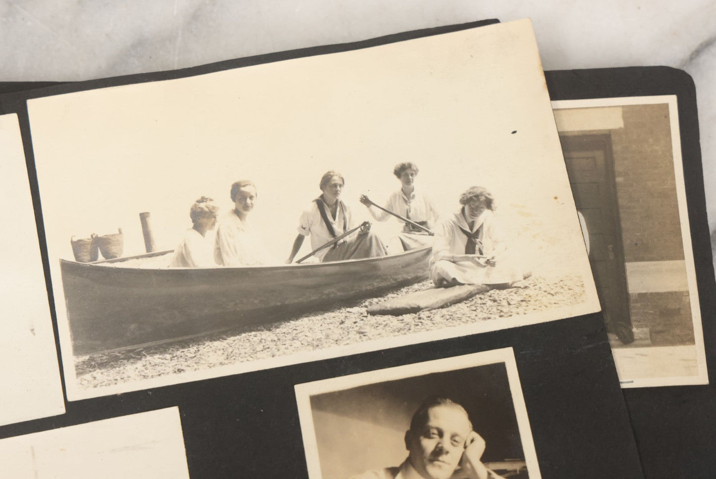 Lot 010 - Antique Vernacular Snapshot Photo Album With 90+ Photographs Circa 1910-1920, Including Baseball Player, Woman Posing With Flag, Bartenders, Many Dogs And Pets, And More