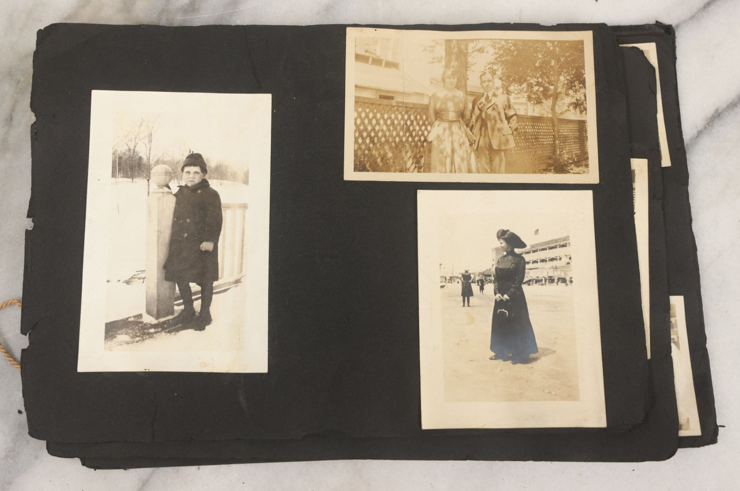 Lot 010 - Antique Vernacular Snapshot Photo Album With 90+ Photographs Circa 1910-1920, Including Baseball Player, Woman Posing With Flag, Bartenders, Many Dogs And Pets, And More