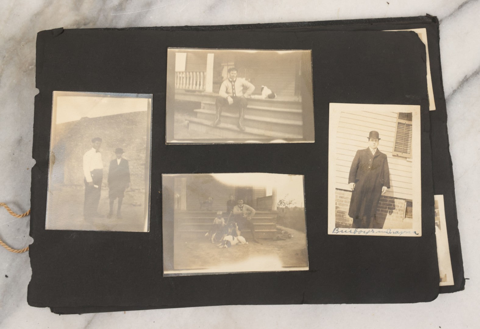 Lot 010 - Antique Vernacular Snapshot Photo Album With 90+ Photographs Circa 1910-1920, Including Baseball Player, Woman Posing With Flag, Bartenders, Many Dogs And Pets, And More