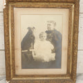 Lot 011 - Antique Framed Portrait Photo Of Mother Child And Their Mixed Breed Terrier Dog In Gilded Molded Gesso Frame, 20-3/8" x 24-1/4"