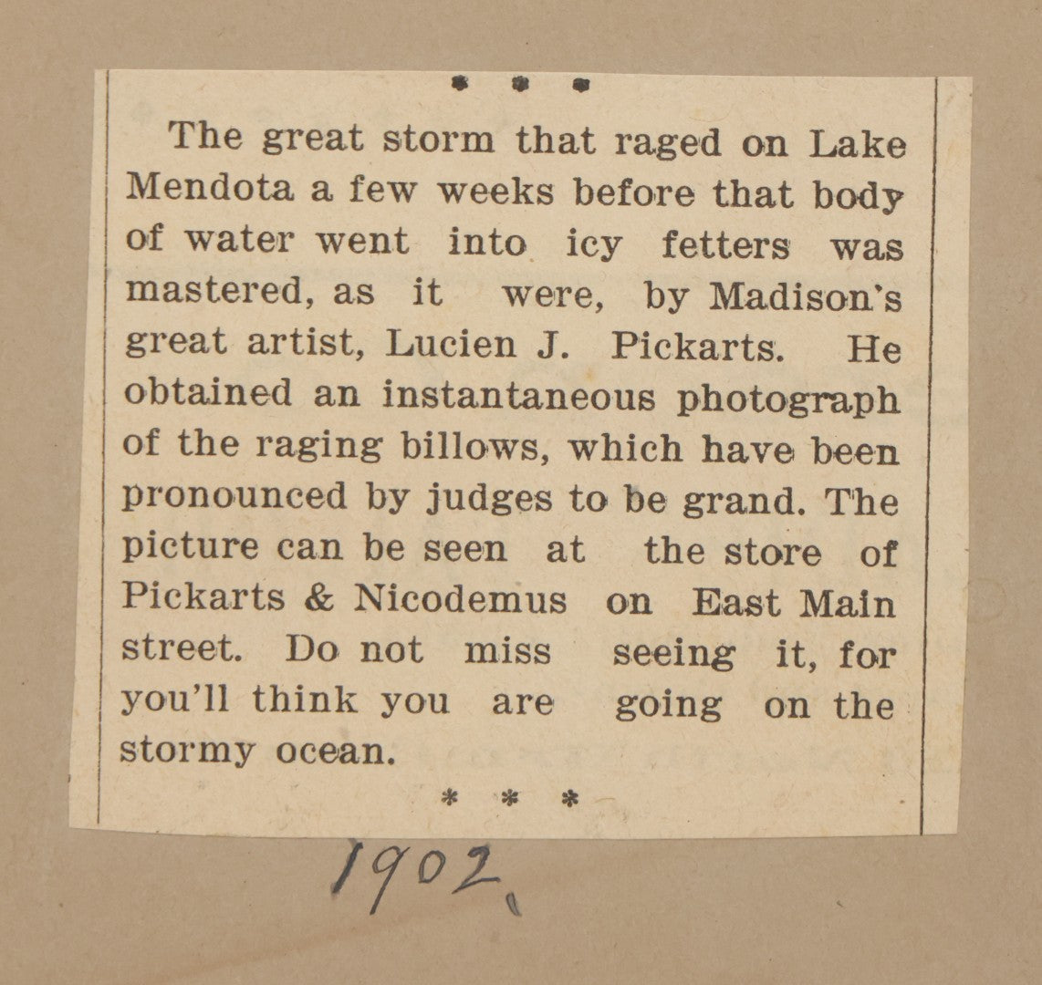 Lot 012 - Antique Boarded Photograph Of Lightning Storm Raging Over Lake Mendota, Madison, Wisconsin, Photographed And Signed By Lucien J. Pickarts, With Newspaper Write Up Promoting Photo On Verso, Note Small Loss To Photo Left Middle, 11" x 8-1/2"
