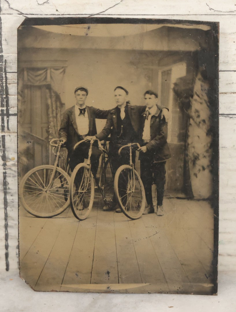 Lot 014 - Antique Tintype Photograph Of Three Young Men Posing With Their Bicycles In Studio, Circa 1890
