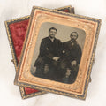 Lot 017 - Antique 1/6th Plate Tintype Photograph Of Two Men, Likely A Father And Son, Sharing An Embrace, Holding Hands, In Full Split Leatherette Union Case