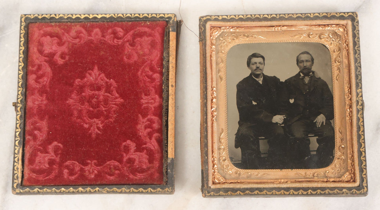 Lot 017 - Antique 1/6th Plate Tintype Photograph Of Two Men, Likely A Father And Son, Sharing An Embrace, Holding Hands, In Full Split Leatherette Union Case