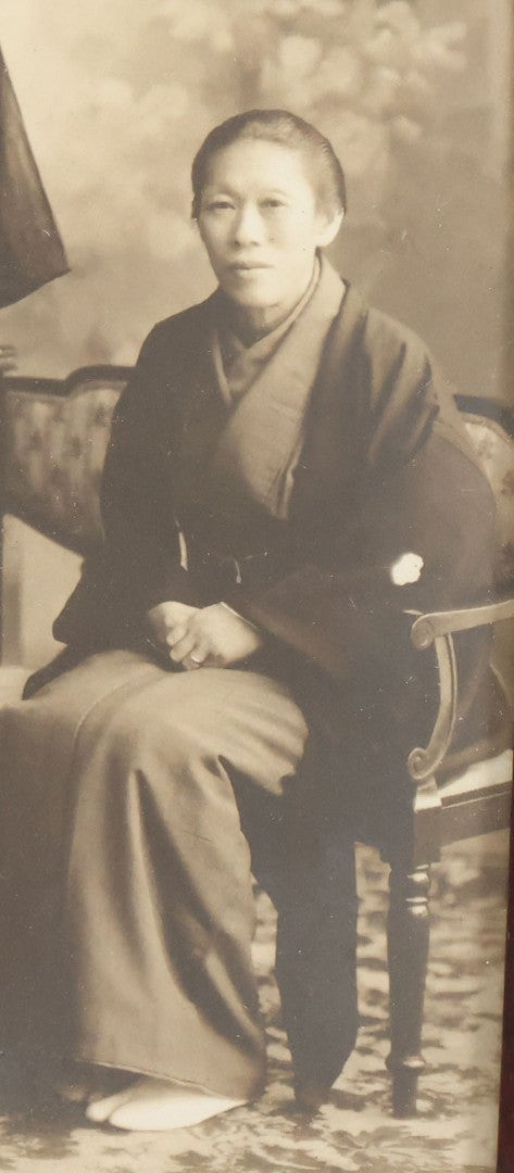 Lot 018 - Antique Trimmed Boarded Photograph Of A Japanese Couple In Frame, Identified On Verso As Shikazo Or Rokuzo, Age 73 Years, Photographed January 6, 1914, Tsujiko Town (Town Or Neighborhood), 4-3/8" x 6-3/8"