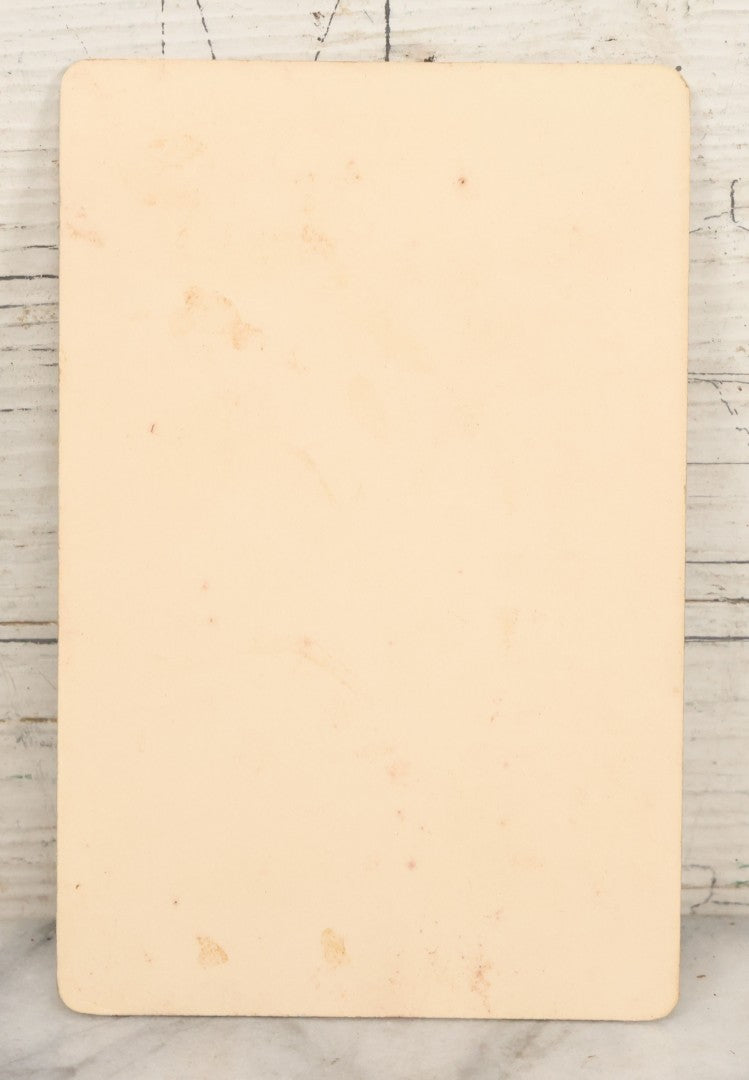 Lot 019 - Antique Cabinet Card Photograph Of A Bearded Priest In Black Robe With Large Pectoral Crucifix Tucked In Belt, Frank Lariviere, Photographer, Central Falls & Pawtucket, Rhode Island