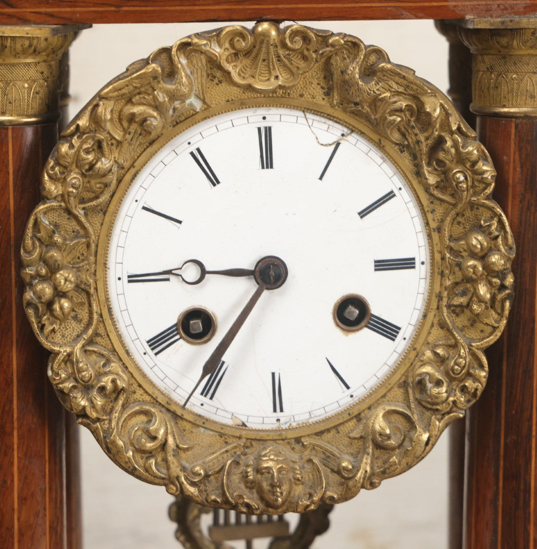 Lot 021 - Antique Inlaid Wood Cased Time And Strike Clock With Brass Adornments, Crane Decorations, Woman's Head On Pendulum, With "Brocot Brevete" Marked Movement, Porcelain Dial, Untested, As-Is, 16-1/2" Height