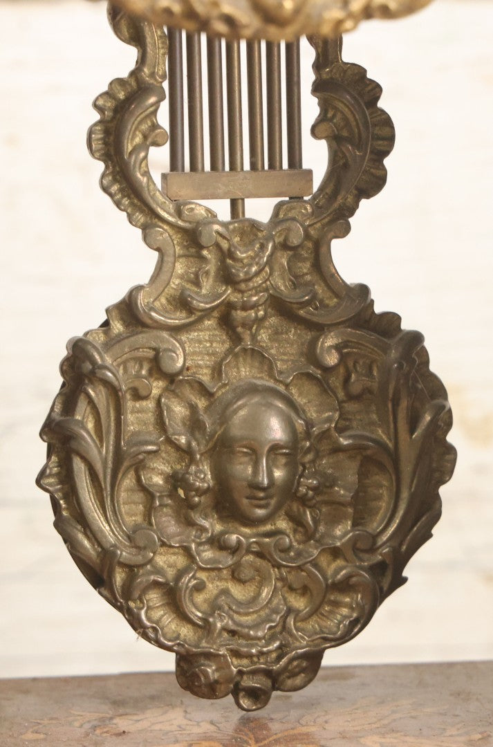 Lot 021 - Antique Inlaid Wood Cased Time And Strike Clock With Brass Adornments, Crane Decorations, Woman's Head On Pendulum, With "Brocot Brevete" Marked Movement, Porcelain Dial, Untested, As-Is, 16-1/2" Height