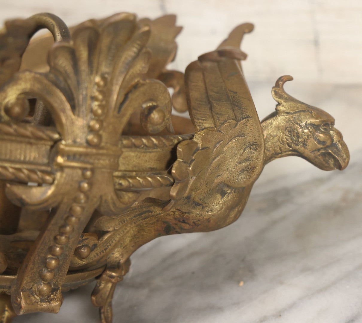 Lot 025 - Antique Cast Brass Ceiling Canopy Light Hanging Fixture With Three Figural Griffins, Fleur-De-Lis Decorations, 10" Diameter x 6" Height