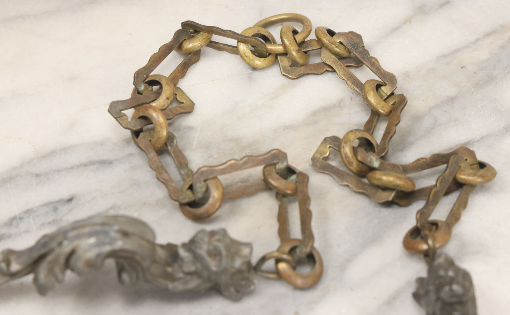 Lot 026 - Antique Cast Metal Figural Griffin Chain Fragment, As Found