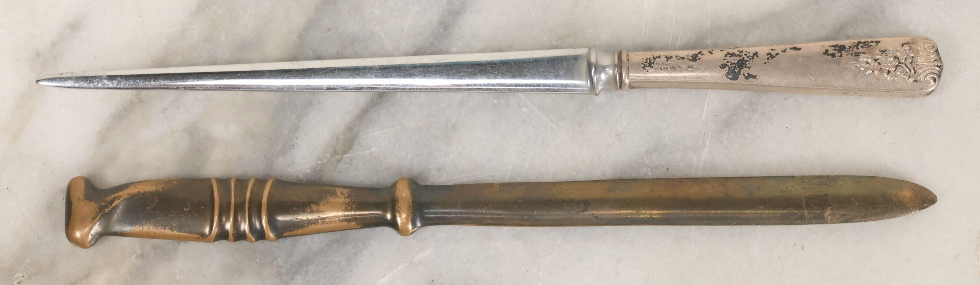 Lot 037 - Pair Of Antique Metal Letter Openers Including Webster Sterling Silver Handled Opener And Bronze Opener