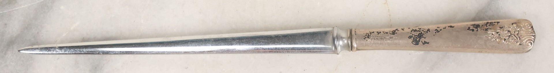 Lot 037 - Pair Of Antique Metal Letter Openers Including Webster Sterling Silver Handled Opener And Bronze Opener