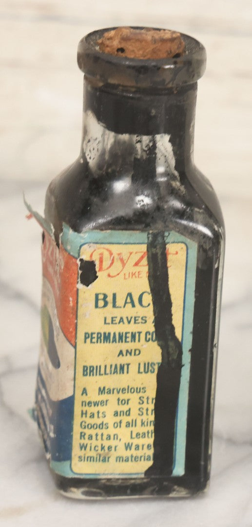 Lot 040 - Grouping Of Four Vintage Ink And Polish Glass Bottles With Paper Labels Including Dyzit Straw Hat Renewer, Sanford's Premium Writing Fluid, Bixby Mahogany Shoe Cleaner, And Bixby Royal Shoe Polish