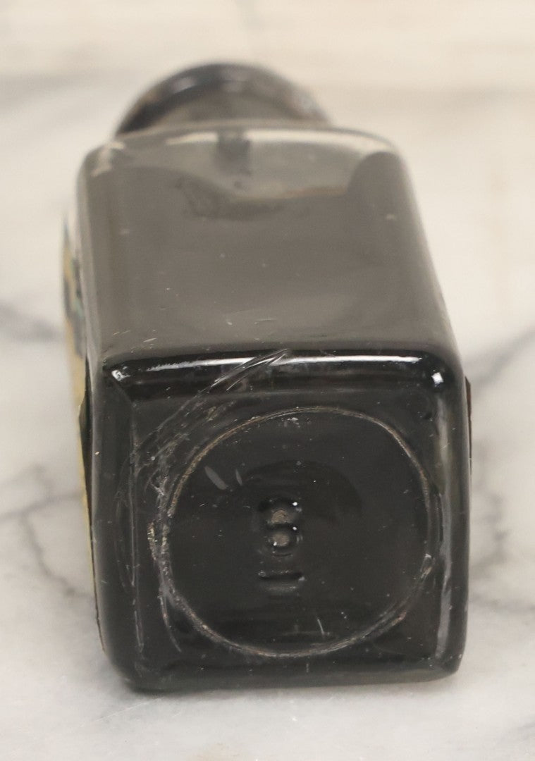 Lot 040 - Grouping Of Four Vintage Ink And Polish Glass Bottles With Paper Labels Including Dyzit Straw Hat Renewer, Sanford's Premium Writing Fluid, Bixby Mahogany Shoe Cleaner, And Bixby Royal Shoe Polish