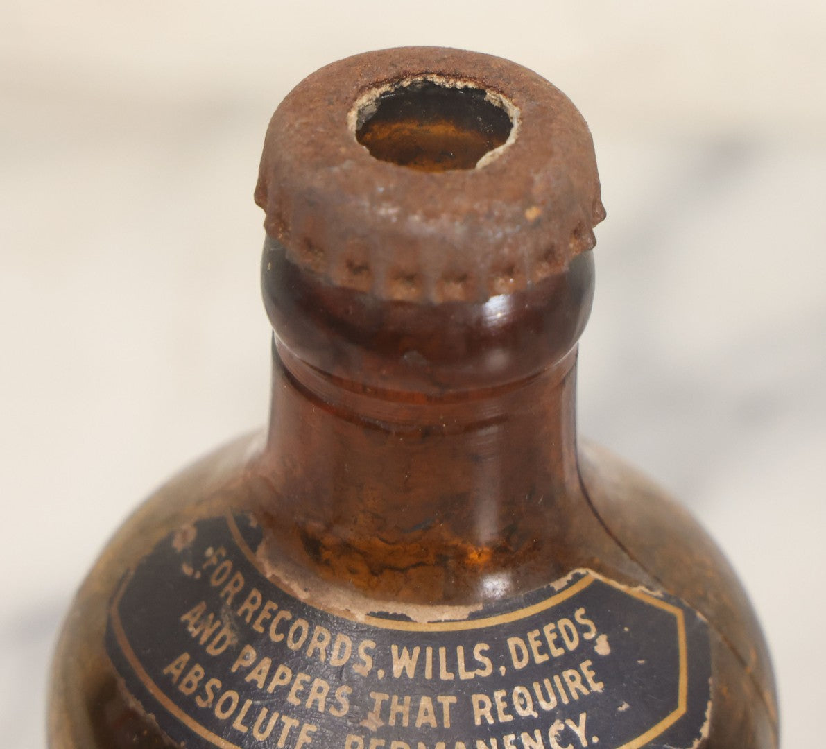 Lot 040 - Grouping Of Four Vintage Ink And Polish Glass Bottles With Paper Labels Including Dyzit Straw Hat Renewer, Sanford's Premium Writing Fluid, Bixby Mahogany Shoe Cleaner, And Bixby Royal Shoe Polish