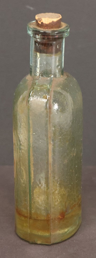 Lot 042 - Antique Superior Hair Oil Clear Glass Bottle With Cork And Remnants Of Contents, Paper Label, Manufactured And Sold By L.F. Wood, West Townsend, Massachusetts, 5-1/4" Height