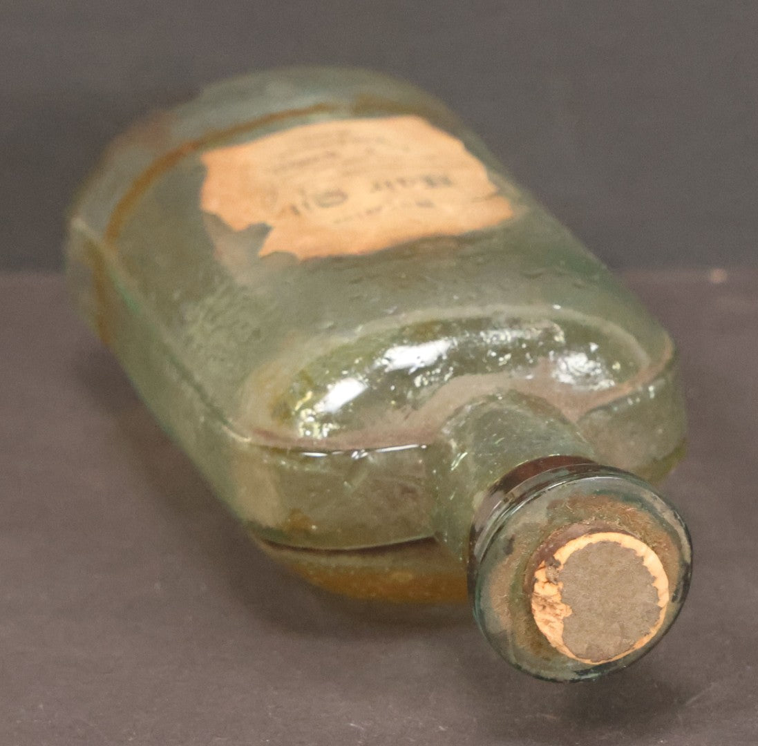 Lot 042 - Antique Superior Hair Oil Clear Glass Bottle With Cork And Remnants Of Contents, Paper Label, Manufactured And Sold By L.F. Wood, West Townsend, Massachusetts, 5-1/4" Height