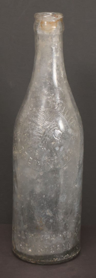 Lot 044 - Antique King Phillip Brewing Co. Clear Glass Bottle, With Native American Chief Motif Logo, Fall River, Massachusetts, 9-1/8" Height
