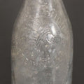 Lot 044 - Antique King Phillip Brewing Co. Clear Glass Bottle, With Native American Chief Motif Logo, Fall River, Massachusetts, 9-1/8" Height